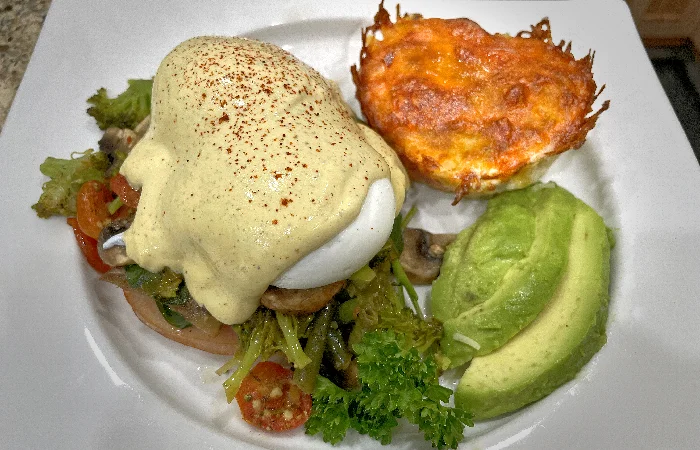 Veggie Eggs Francis with avocado and au gratin hash brown cassarole