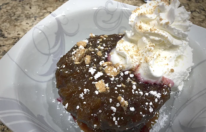 Gluten Free Brownies with peanut sprinkles and whipped cream