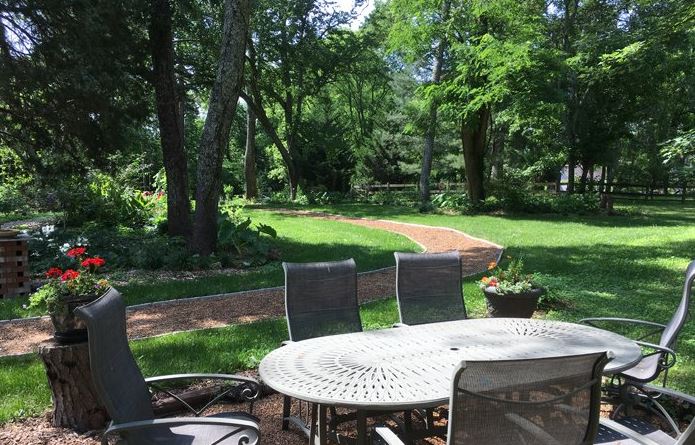 Garden seating area at St Francis Cottage